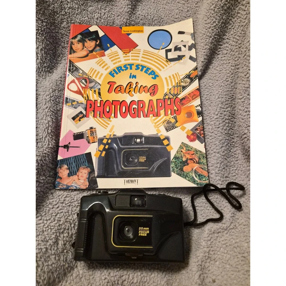 Vintage 35mm Focus Free Point and Shoot Film Camera with Photography Guide Book